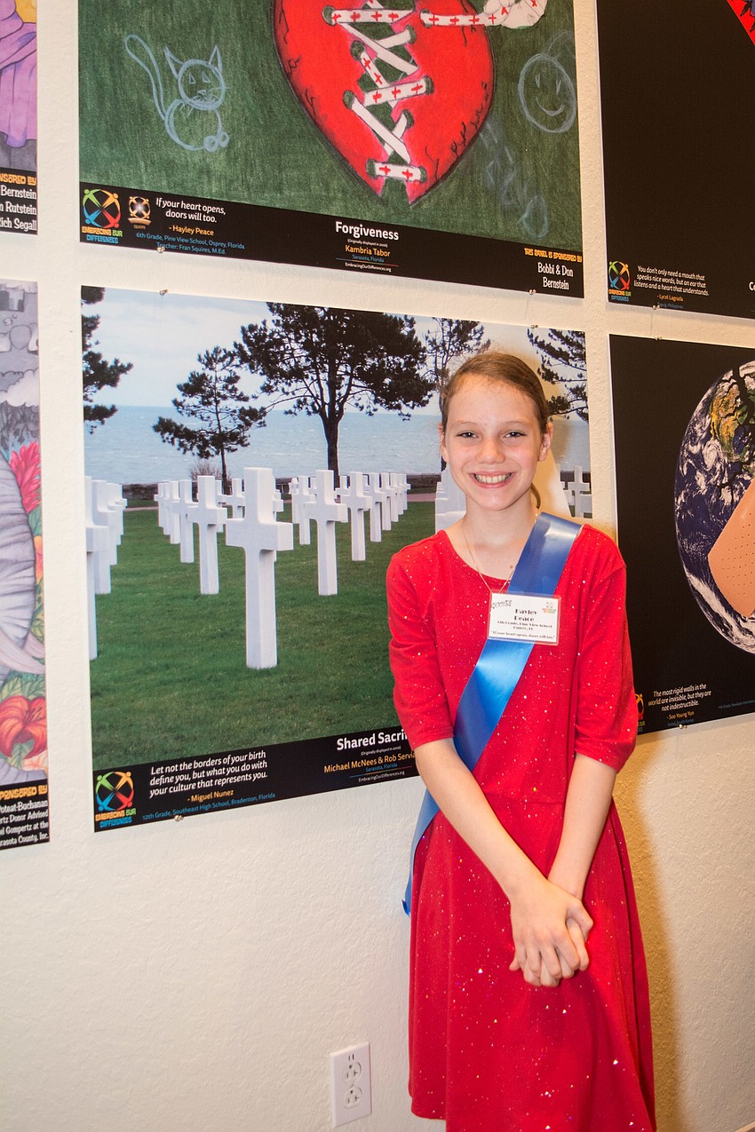 Pineview School student Hayley Piece stands next to her winning quote.