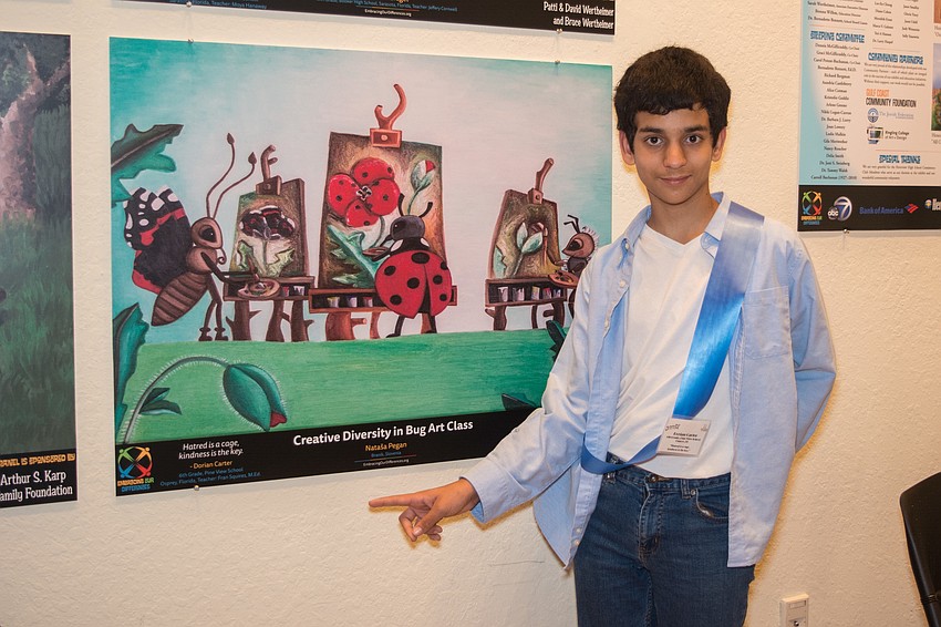 Dorian Carter points to his winning quote submission.