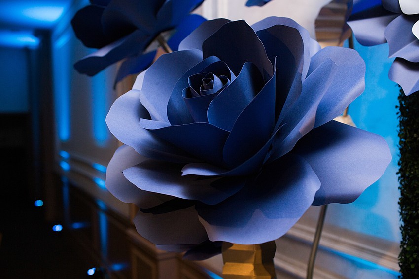 Paper flowers by CC's Paper Artistry decorated the front of the ballroom.