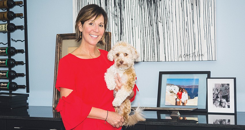 SCAD survivor Tracee Murphy in her home with her dog, George.