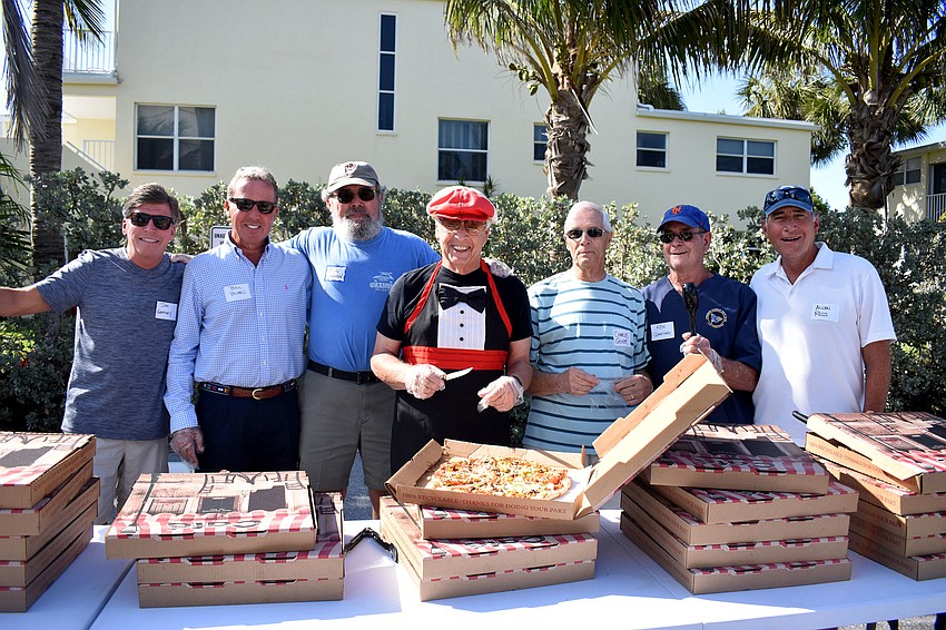 Jim Gaffney, Bill Burns, Bill Coughlin, Tom Vitro, Charles Geiger, Ken Comeforo and Allen Ross served pizza to guests.