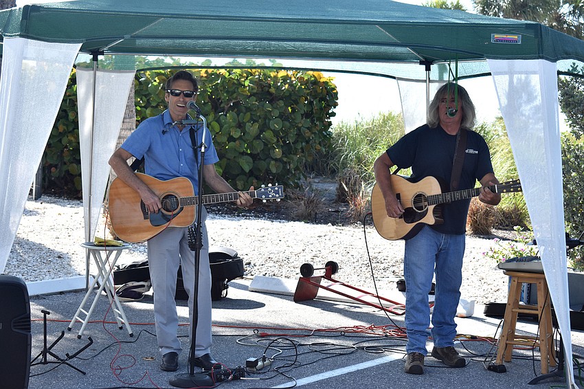 The CanAm Duo performed live music during the event.