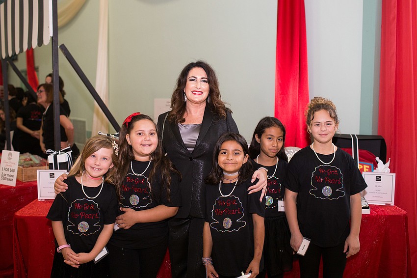 Terri Najmolhoda with the Girls Inc. girls.