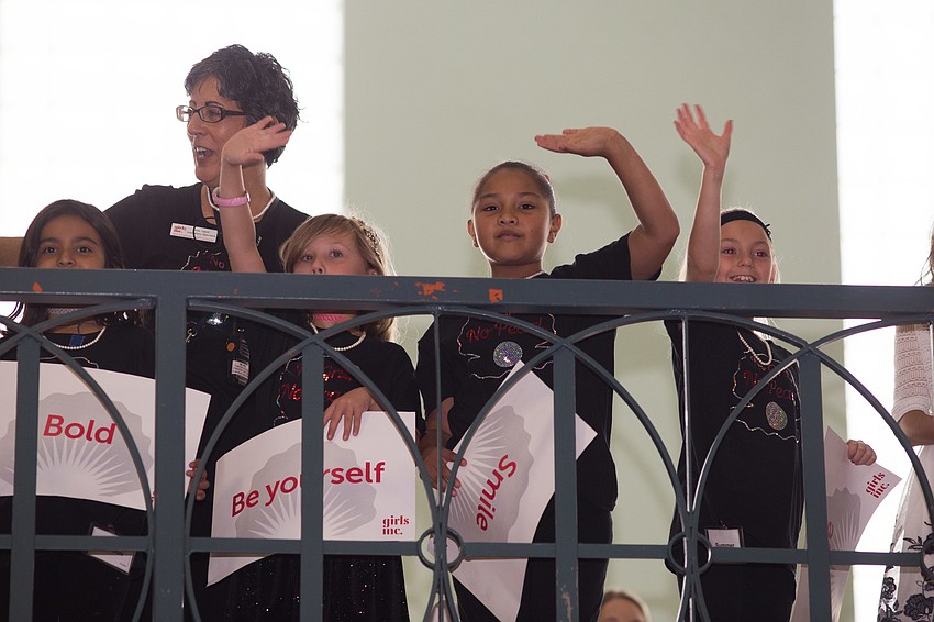 The girls waved to the audience to thank them for coming.