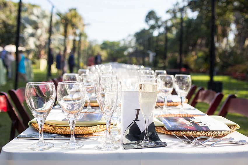 The table stretched across the gardens.