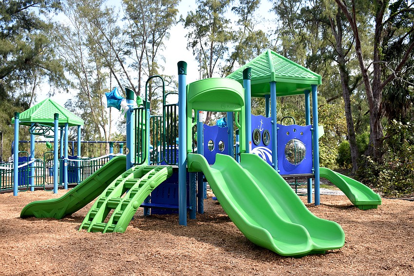 The new playground was built by numerous volunteers, including local firefighters.