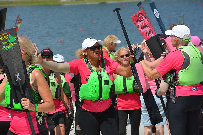 Tee Thomas is drained but happy after Survivors in Synch set a team record time in the 500 meters.