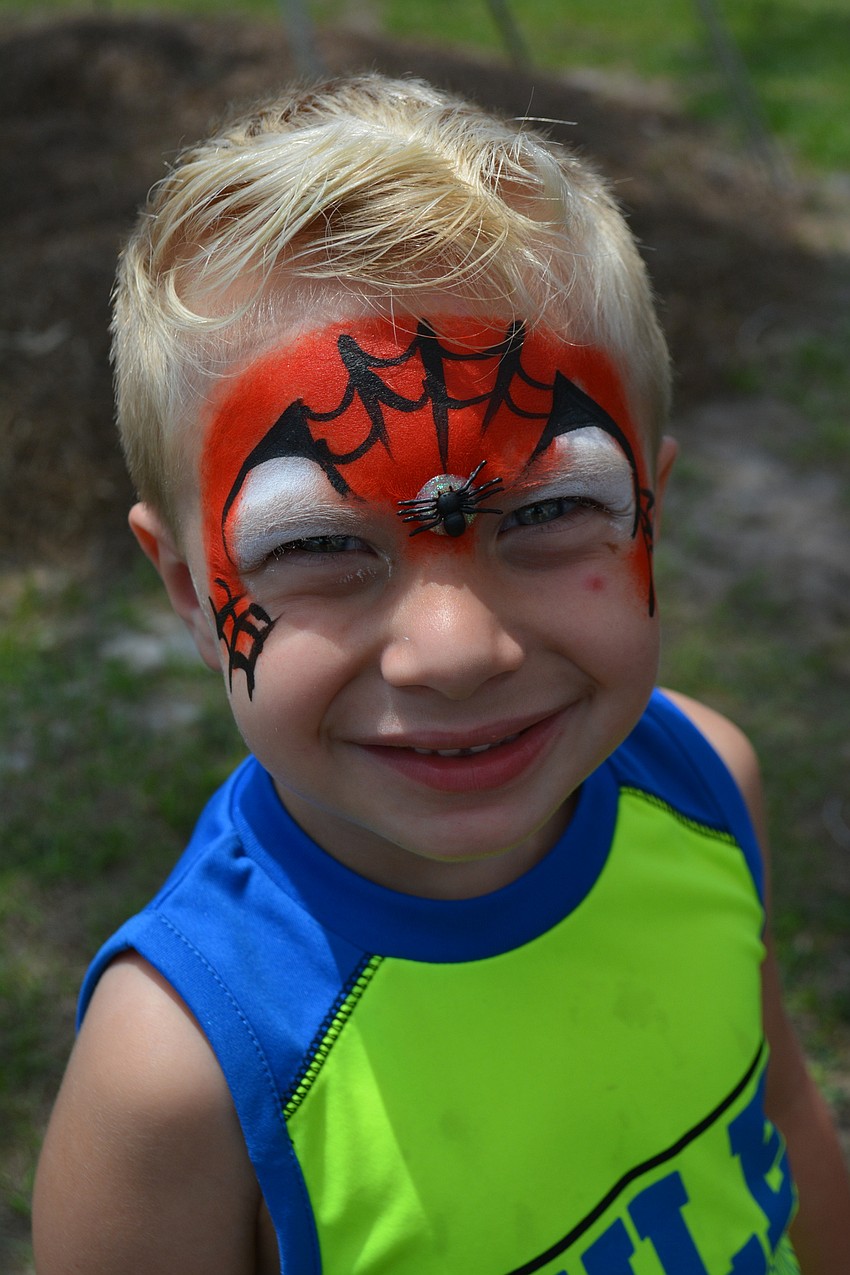 Lakewood Ranch's Matthew Lawton, 3, shows off his Spiderman face painting.