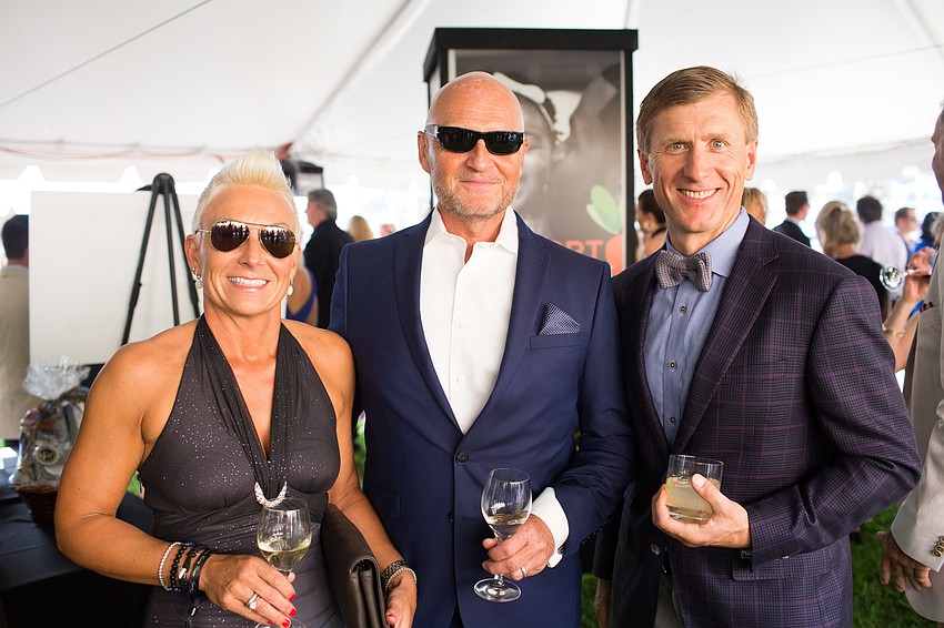 Mette and Michael Milland with Greg Twarowski