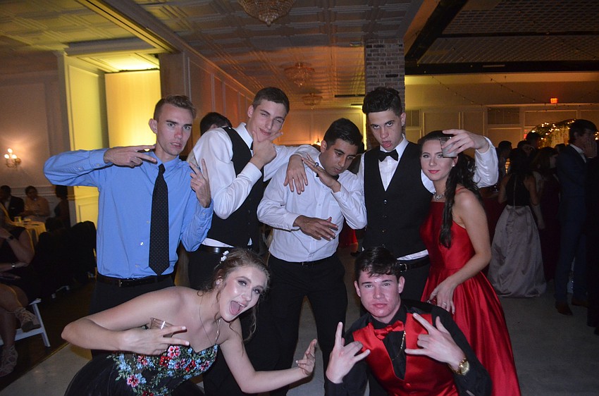 Jacob Hysell, Tatum Godfrey, Christian Ashworth, Felix Martinez, Dylan Forsyth and Kate Wilson pose for another prom memory.