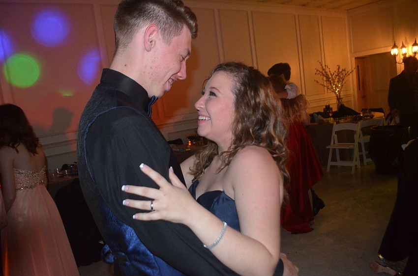 Senior James Fowler and sophomore Kiaria Locke get close for a slow dance.