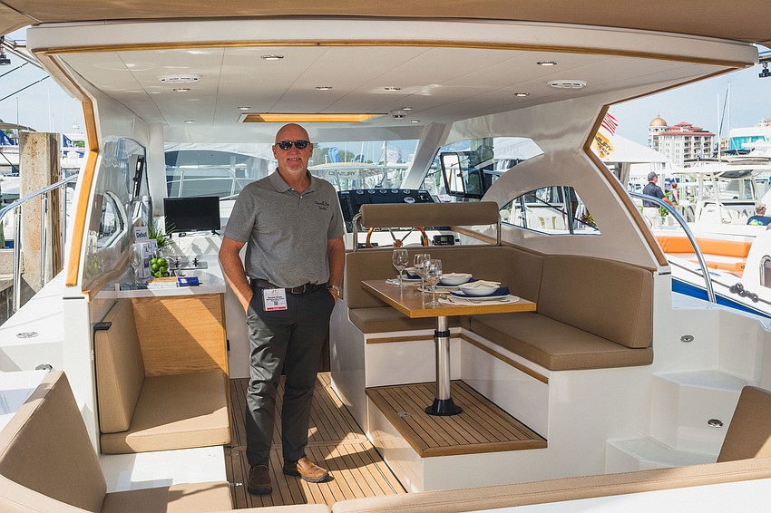 Randall Hinely debuts his newest boat at the Suncoast Boat show.