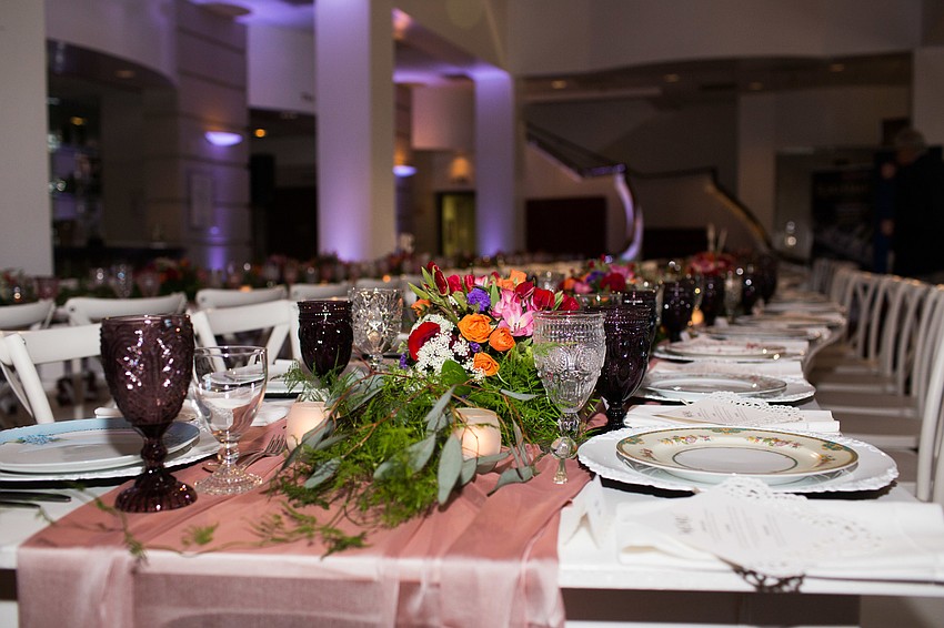 Colorful flowers lined the center of the tables.
