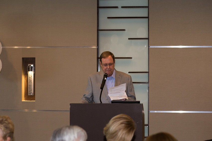 Board President Jack Kidd welcomes the guests.