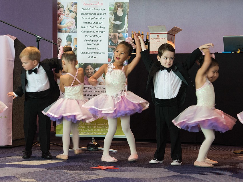 Students from Stage Door Preschool of the Arts perform for the event's guests.