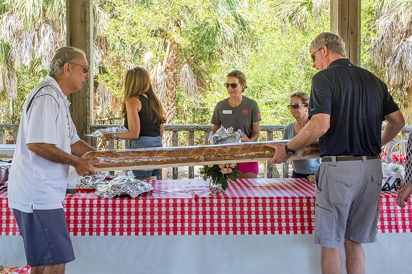 A six-foot long sandwich awaited members.