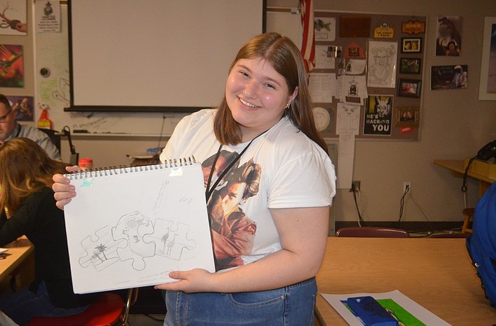 Amanda Gillick, a junior, drew the rough sketch for the Surfers for Autism and wants to continue with art after high school.