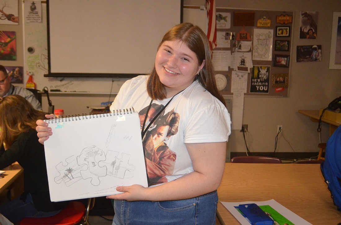 Amanda Gillick, a junior, drew the rough sketch for the Surfers for Autism and wants to continue with art after high school.