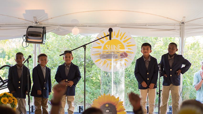 The students performed spoke word poetry before dinner.