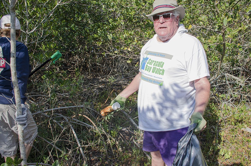 Scott Macbeth was one of more than 60 people who volunteered to help clean Sister Keys.