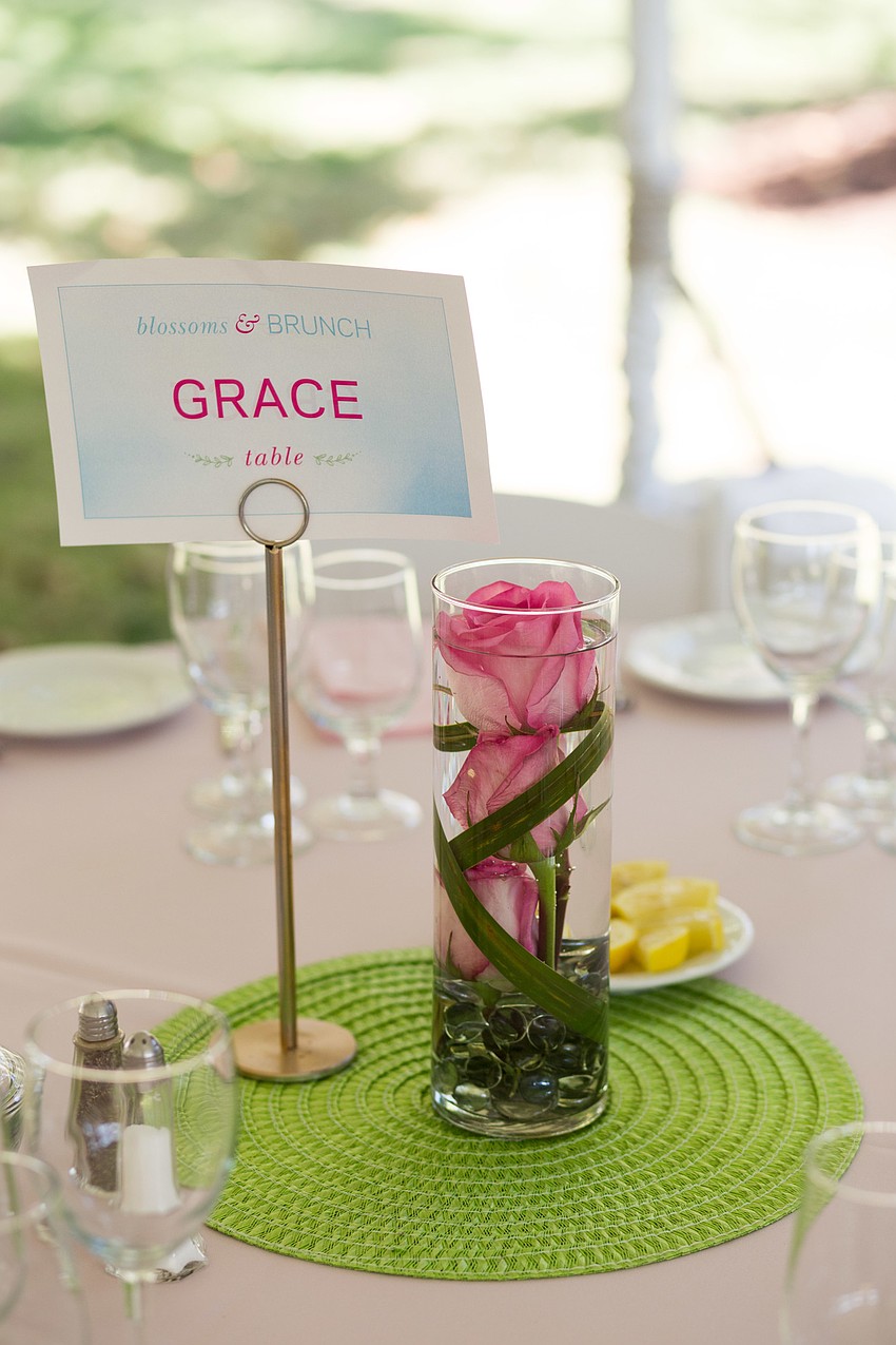 Floating rose vases decorated the tables.