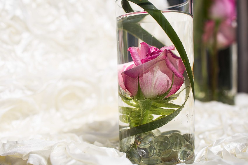 Guests were able to make a floating rose vase to take home with them.