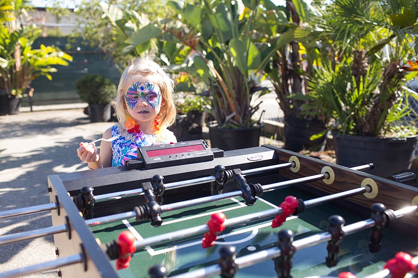 Kelsey Lodge eats Kona ice.