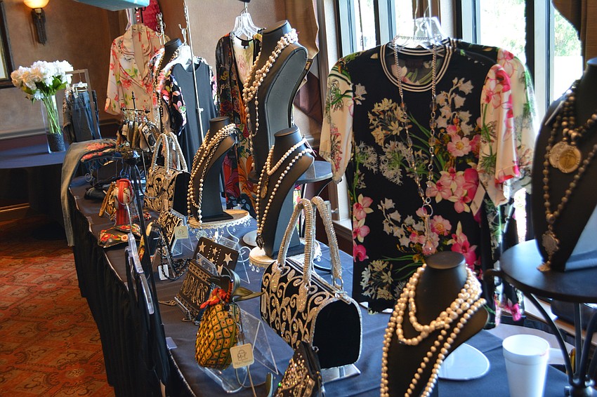 Foxy Lady of St. Armands Circle displays fashion items at the event.