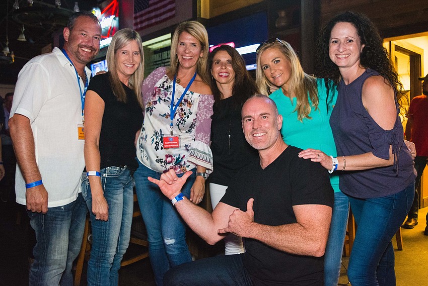 Jonathan and Linda Hoffberger, Lindsey Mertzlufft, Jennifer Goodman, Cheri Deguia, Heather Caldwell and Dr. Frederick Yturralde, front.