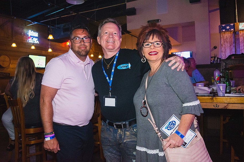 Jeremy Martin, Dr. Bob Cozer and Melissa Guthrie