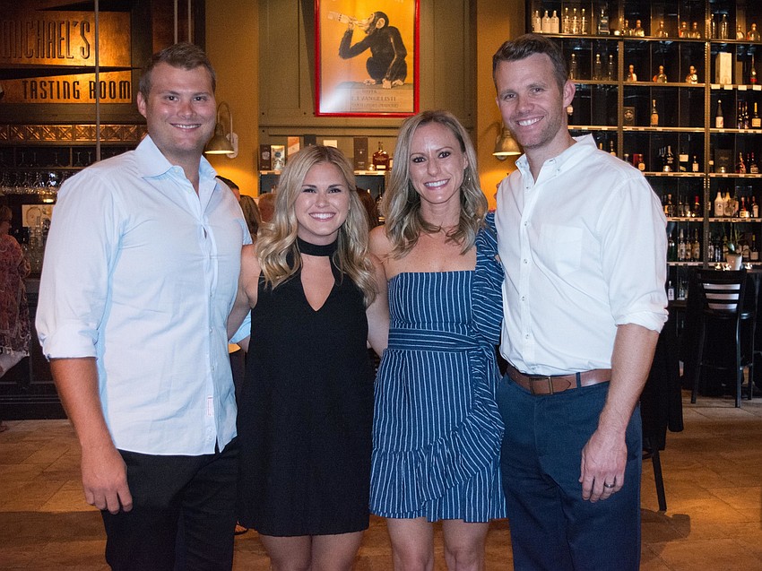 Michael and Ellen Johnson with Lauren and Eric Blomster