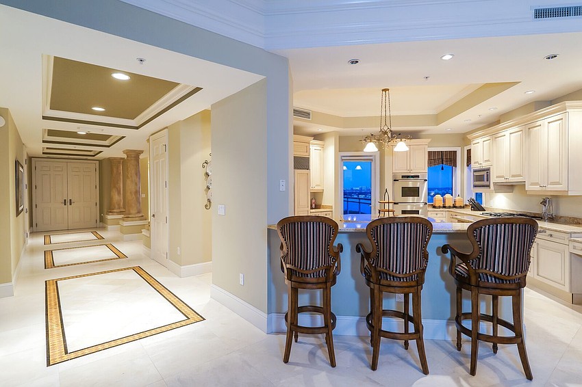 A private elevator connects the ground floor to the 12th-floor living space.