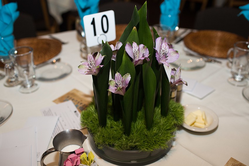 Floral arrangements adorned the tables.