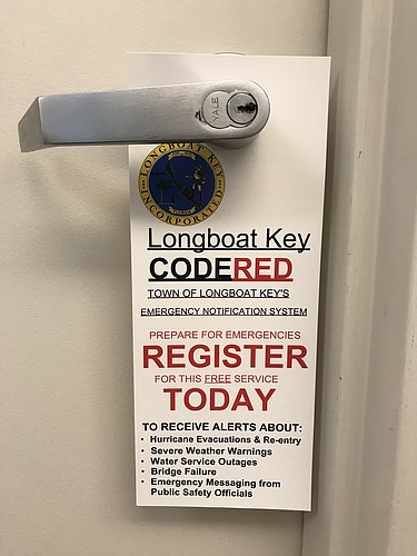 Longboat Key Fire Rescue crews recently went door-to-door giving residents CodeRED door hangers. Courtesy photo.