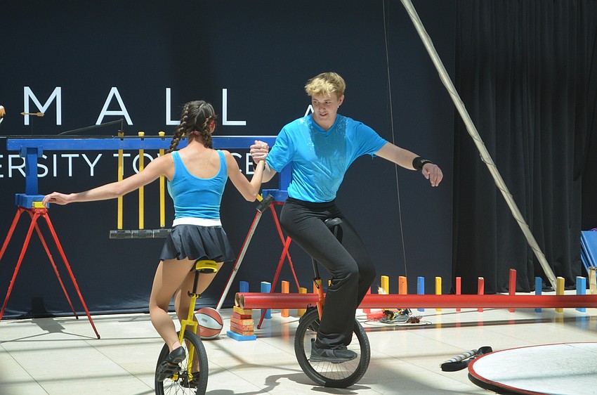 Jeanni Castro and Tommy Johnson, ninth-graders in Sarasota, will benefit from the Giving Challenge when donations go to the Circus Arts Conservatory.