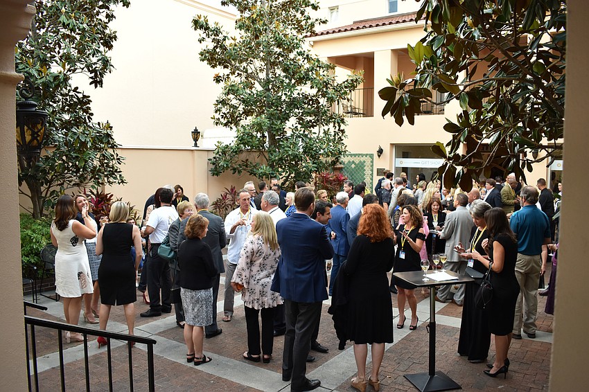 Sponsors and cast members enjoyed light bites and cocktails in the Donna Wolf Steigerwaldt Courtyard of the Sarasota Opera House prior to the show.