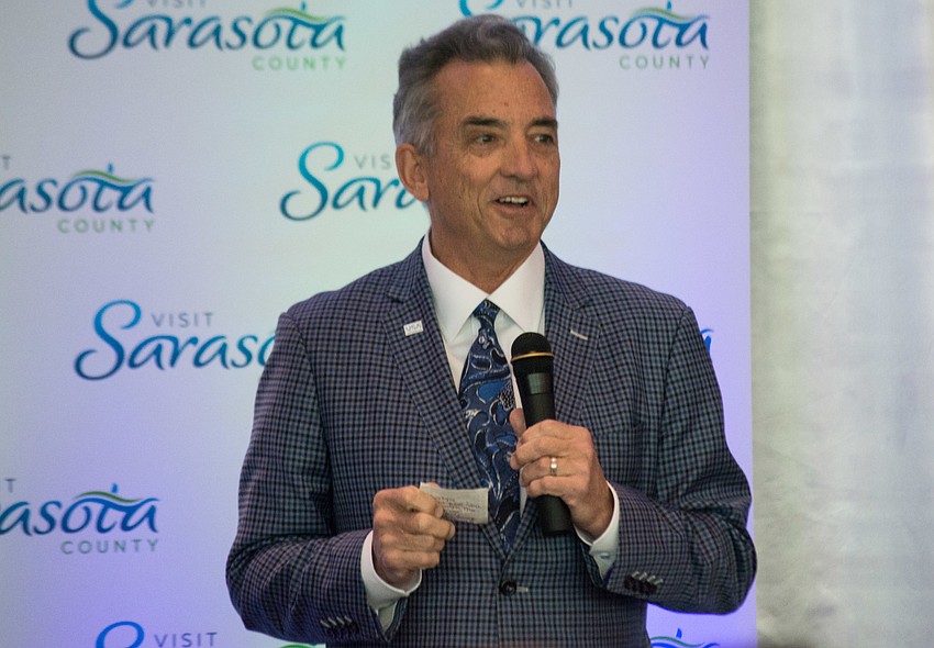 Keynote speaker Christopher L. Thompson, president and CEO of Brand USA, talks to guests.