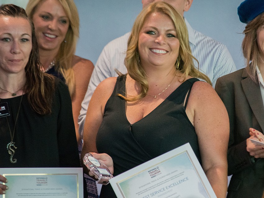 General manager of Siesta Key Oyster Bar Stephanie Brown, right, wins the Guest Excellence in Management Award.