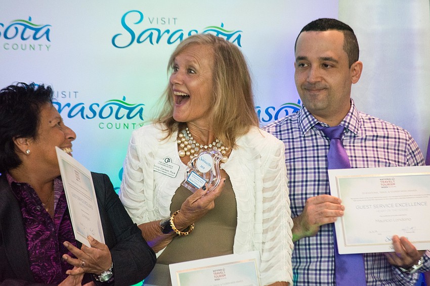 Marcia Carlson Pack accepts her award for Guest Service Excellence in Heart of House award.