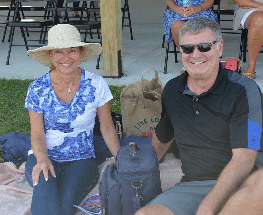 Lynn Wolf and Mark Wolfgram of Lakewood Ranch spread out a blanket on the grass to watch the show.