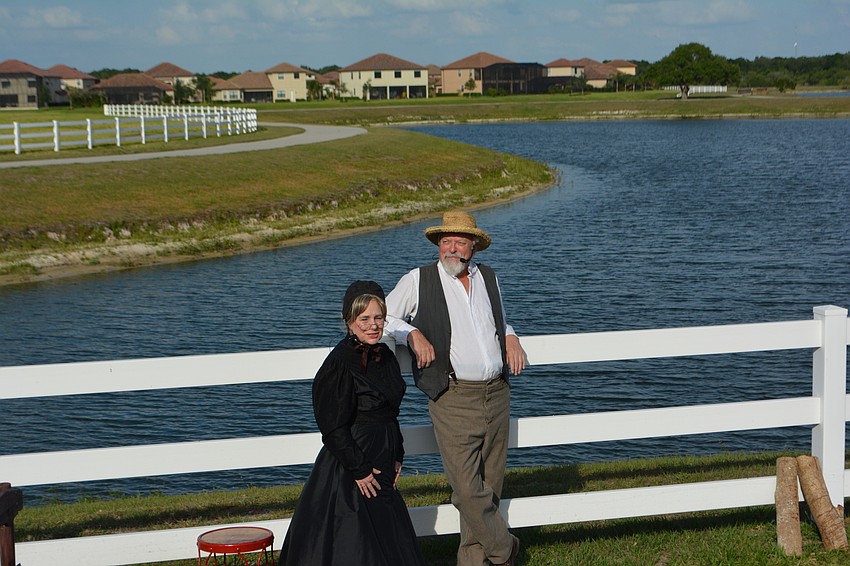 Gayle Foster as Widow Douglas and Derek Dutcher, who played a dual role as Boatman and Doc, relax before the start of the show.