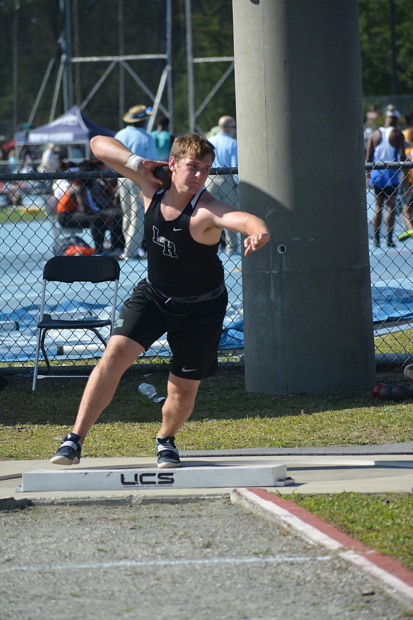 Lakewood Ranch senior Noah Oxley spins and throws in the 4A boys shot put. Oxley finished 17th overall (47.8 feet).