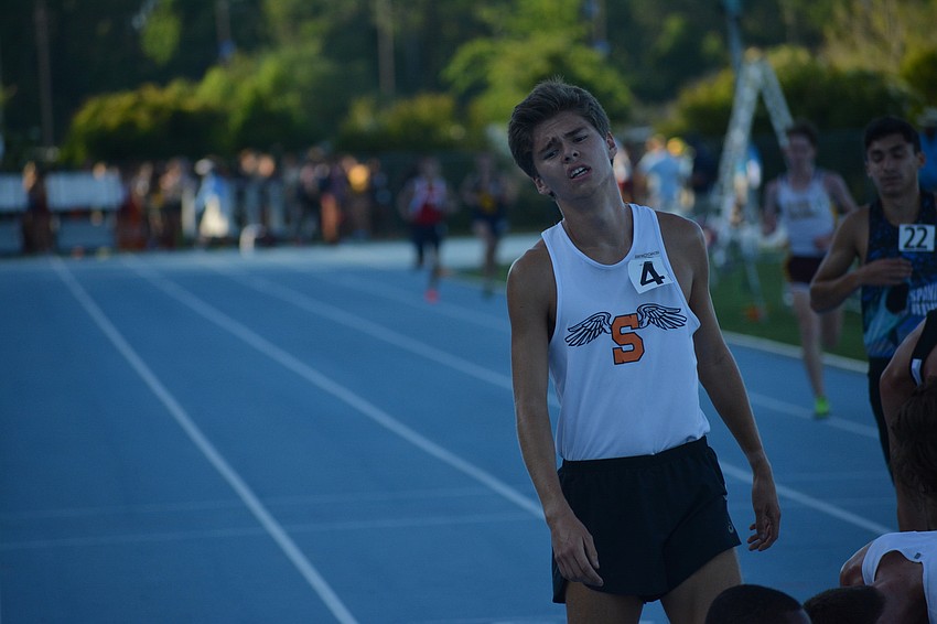Ben Hartvigsen lets the disappointment roll off his face after finishing fourth in the 4A boys 3200-meter race (9:21.99).