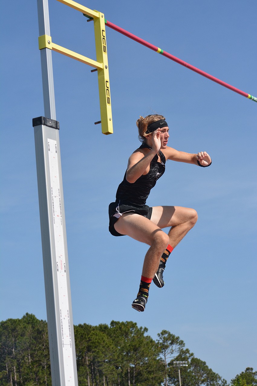 Lakewood Ranch senior Nick Napier falls to Earth after clearing the bar in the 4A boys pole vault. Napier finished eighth overall.