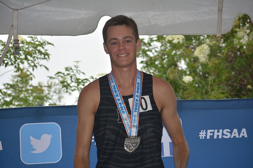 Johnny Reid finished second (4:19.14) in the 4A boys 1600-meter race.