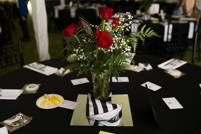 Roses adorned each of the tables.