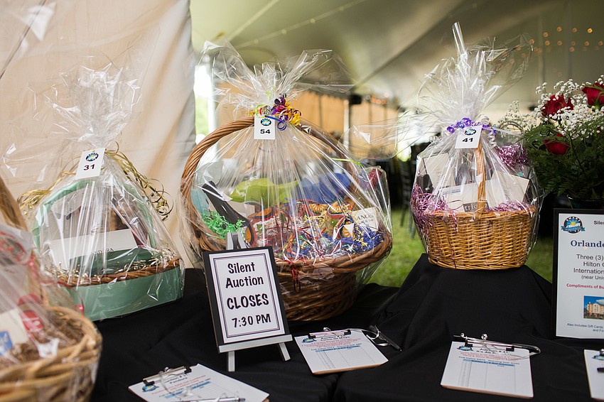 Silent auction baskets were available for bids throughout cocktail hour.