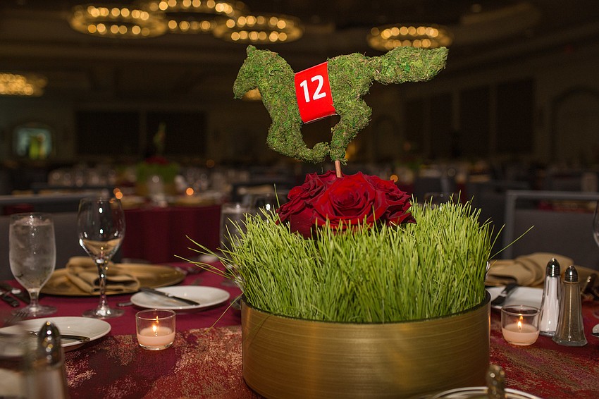 Racehorses numbered the tables.