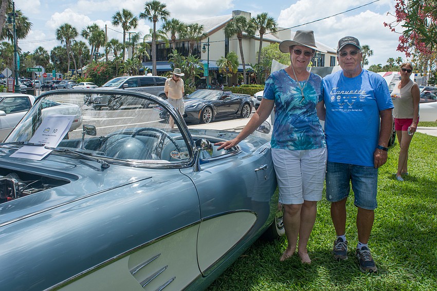 Evelyn and Ed Jolly with their 1959 Frost Blue Convertible.