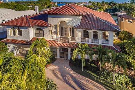 The home at 875 Siesta Key Circle recently sold for $2.05 million. Built in 1990, it has four bedrooms, four baths, a pool and 5,423 square feet of living area.